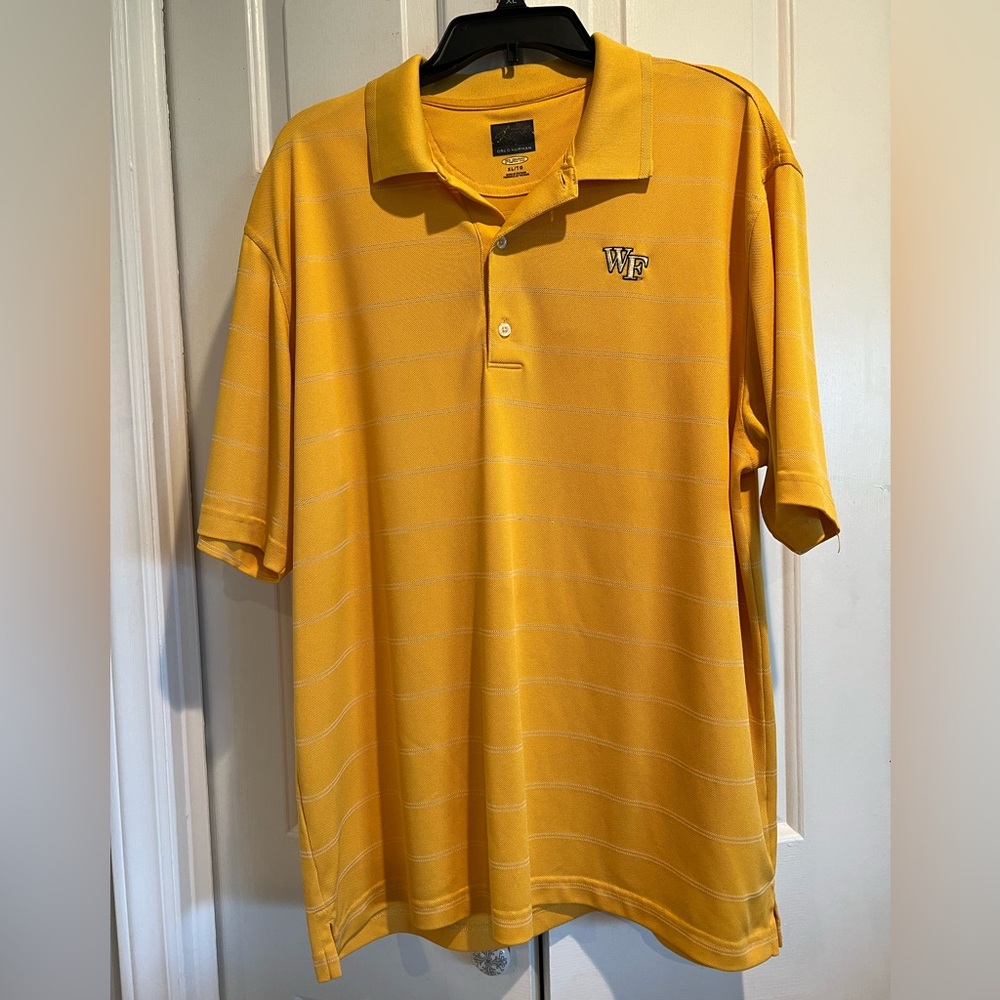 WAKE FOREST , Gold, Short Sleeve Polo by the GREG NORMAN Collection- Wake Forest